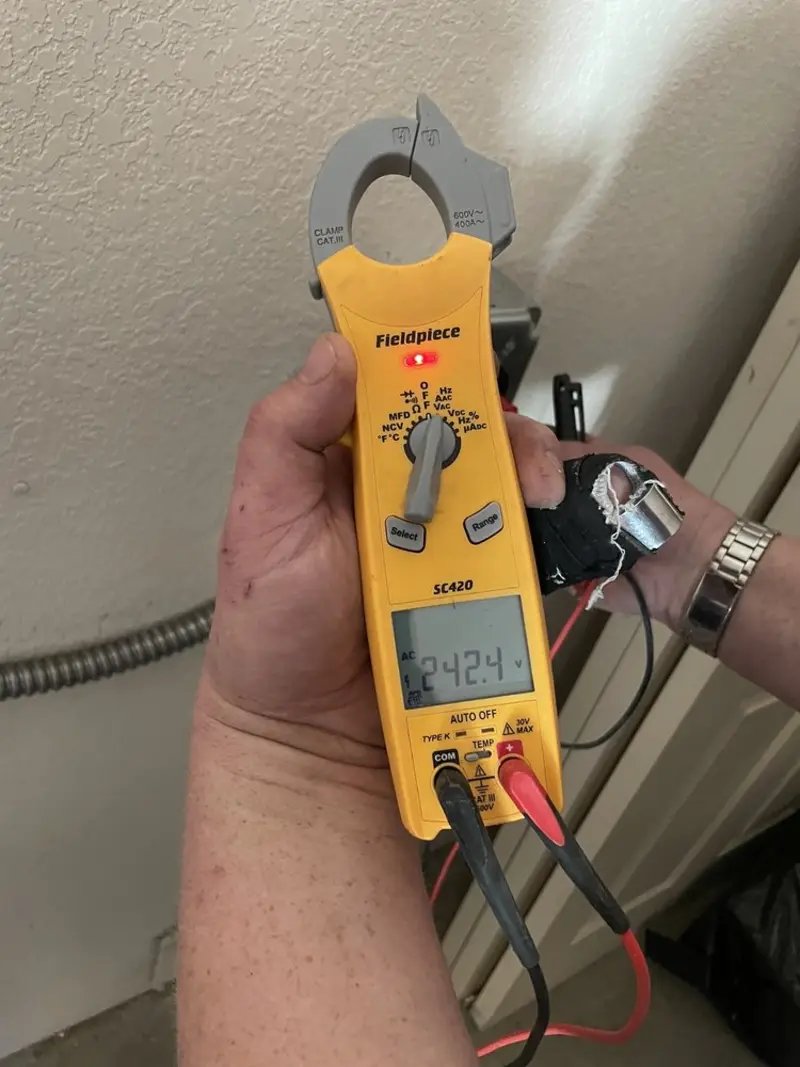 Voltage testing with clamp meter during Generator Installation in Bowling Green
